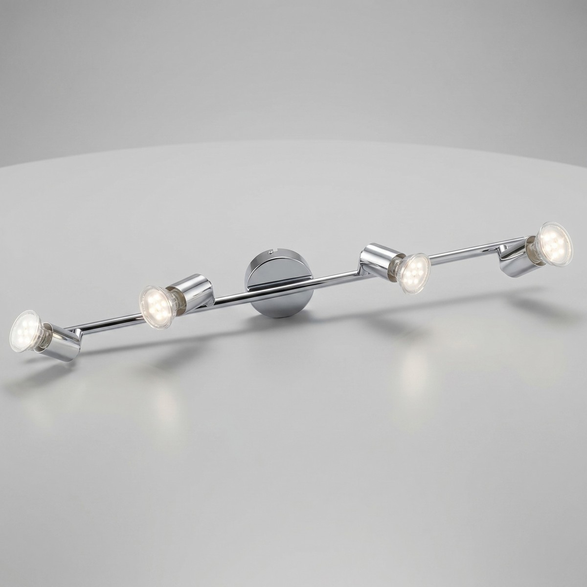 faretto spot quadruplo LED orientabile in finitura cromo