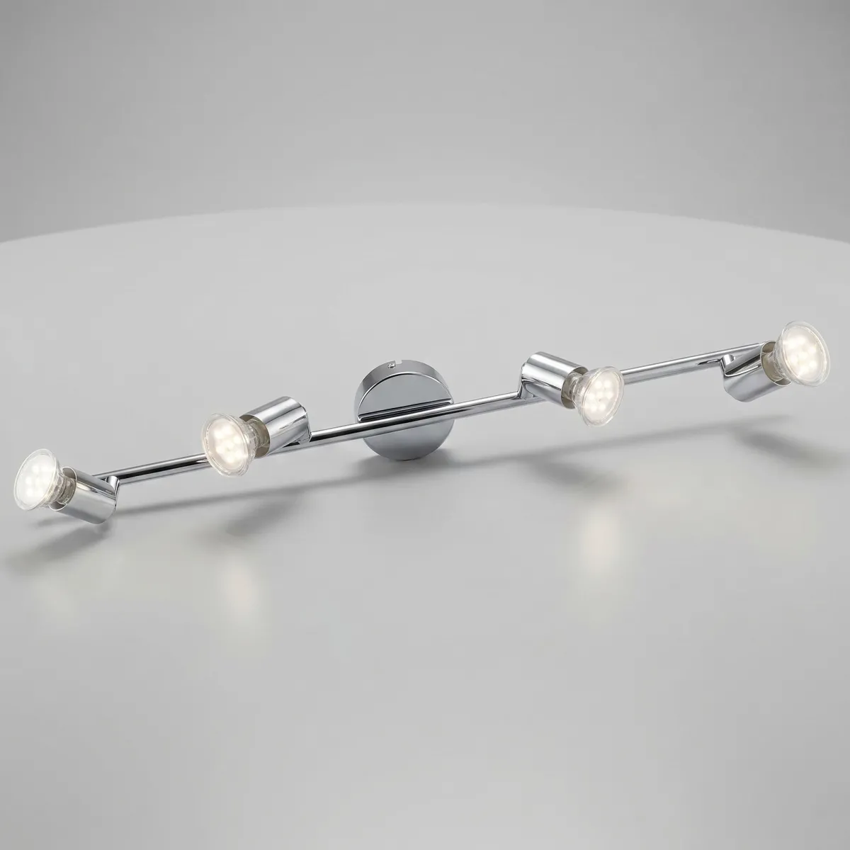 faretto spot quadruplo LED orientabile in finitura cromo