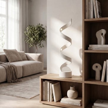 lampada da tavolo a spirale LED, proposta nell'iconica versione bianca luminosa o nera decisa