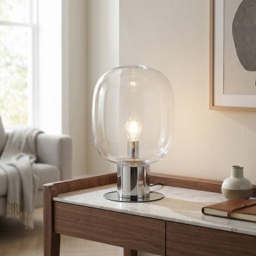 lampada da tavolo moderna, disponibile nella luminosa finitura cromo specchiato o nel caldo e prezioso oro.