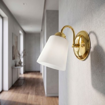 Elegante Wandleuchte mit geschwungenem Arm in Nickel oder Gold | Mondialshop