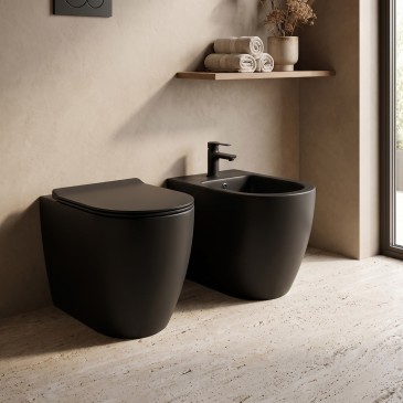 Sanitari filo muro wc e bidet NERI traslati con sedile rallentato rimless | Nemesi